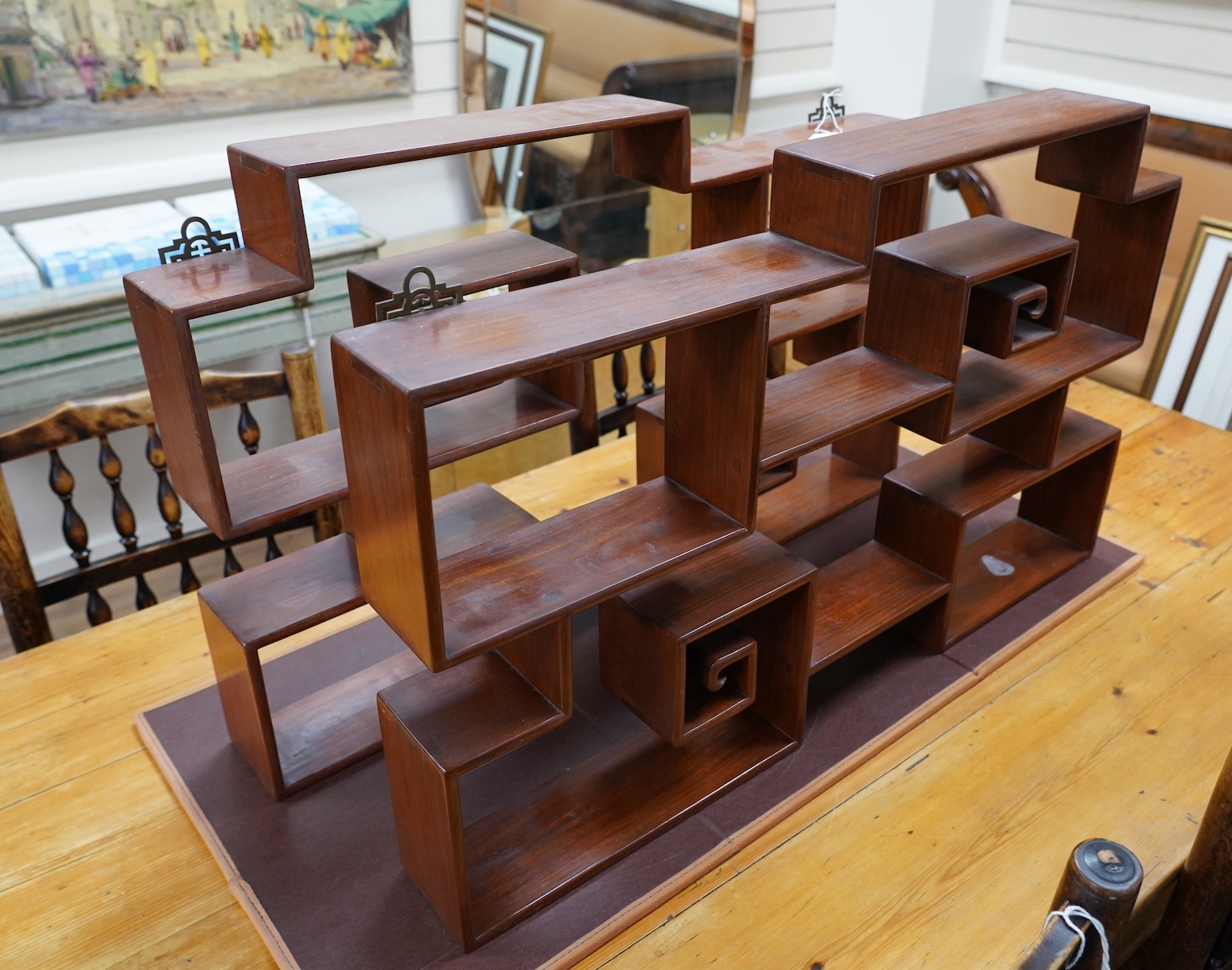 A pair of Chinese padouk wood display shelves, width 80cm, depth 10cm, height 51cm. Condition - fair